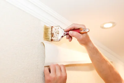 Pose de papier peint à Cortambert — revêtements muraux et toiles de verre